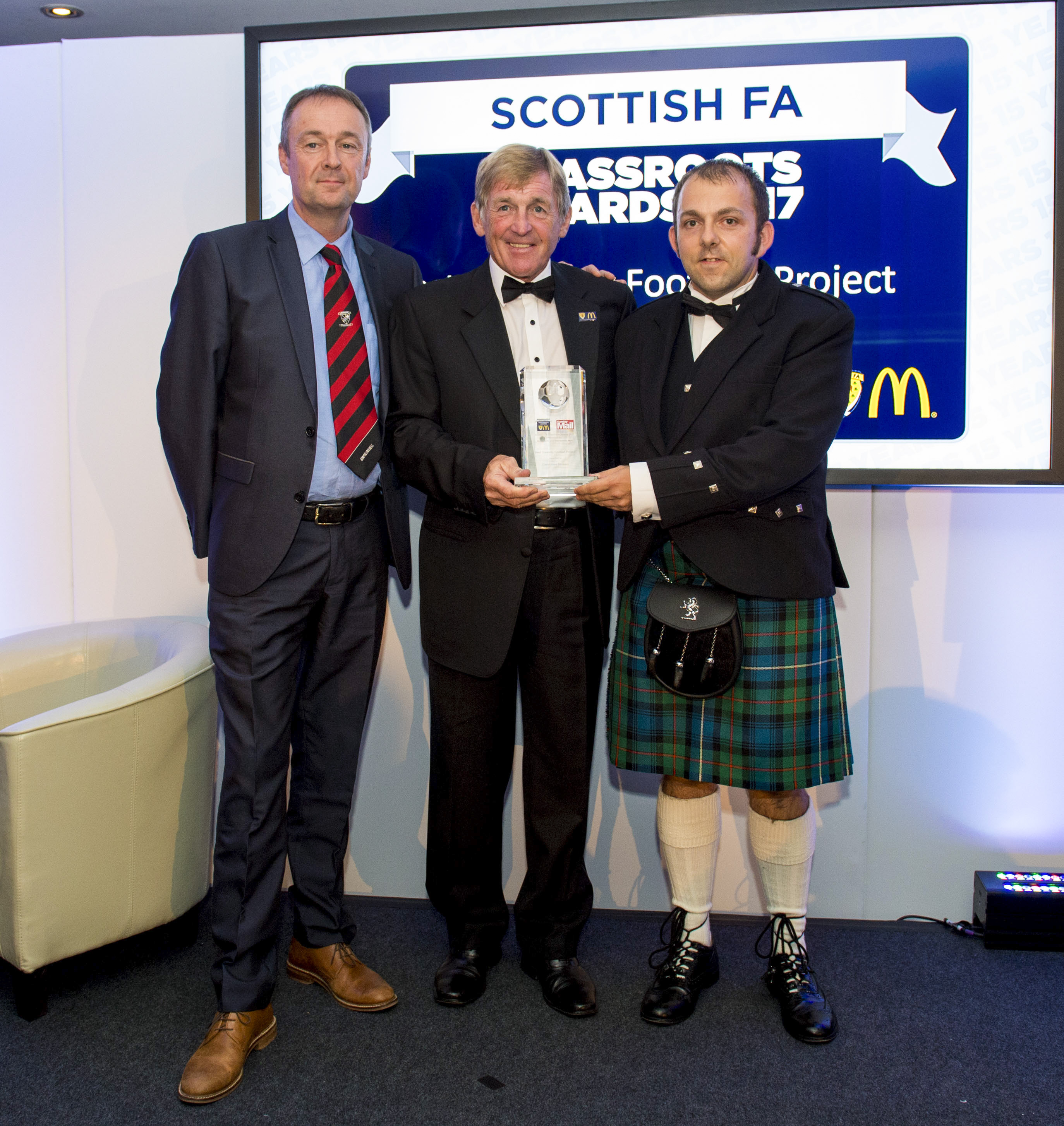Brian & Andrew recieving award from Kenny Dalglish